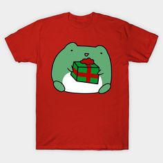 A cute fat frog holding a Christmas gift. -- Choose from our vast selection of Crewneck and V-Neck T-Shirts to match with your favorite design to make the perfect custom graphic T-Shirt. Pick your favorite: Classic, Relaxed Fit, V-Neck, Tri-Blend, Dolman Extra Soft Tri-Blend, Slouchy V-Neck, Slouchy, Premium, Heavyweight, Curvy, Ringer, and Curvy V-Neck. Customize your color! For men and women. Frog T Shirts, V Neck T Shirt, Graphic T Shirt, Hold On, Christmas Gift, Shirt Designs, Tshirt Designs, Relaxed Fit, Men And Women