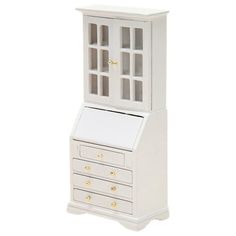 a white cabinet with drawers on top of it