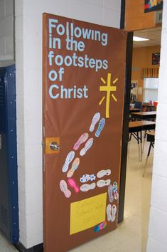 a bulletin board with the words following in the footprints of christ