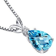 Turn some heads: This stunning Lagoon Blue Hue Swiss Blue Topaz Pendant are a true color statement. Polished 14 Karat White Gold makes it easy to wear. Style P8948 Blue Topaz Jewelry, Blue Topaz Pendant, Fancy Gifts, Topaz Pendant, Zircon Jewelry, Blue Topaz Stone, Swiss Blue Topaz, December Birthstone, Topaz Gemstone