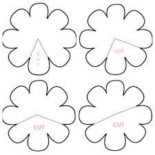 four flower cut outs are shown with the words cut out