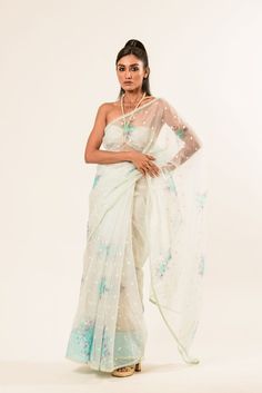 Explore the elegance of our White Organza Saree with floral embroidery. Perfect for any event, it combines comfort with style, ensuring you look and feel regal. Elegant Saree Sets With Floral Embroidery, Elegant Floral Embroidered Saree Set, Chanderi Traditional Wear With Floral Embroidery For Reception, Formal Georgette Saree With Intricate Embroidery, Formal Unstitched Saree With Intricate Embroidery, Formal Saree With Resham Embroidery, Elegant Fitted Saree With Floral Embroidery, Summer Reception Georgette Dupatta, Summer Reception Dupatta In Georgette