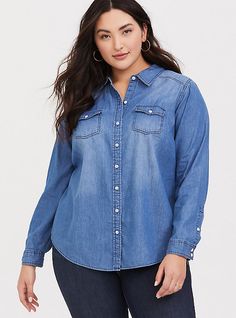 Versatile, comfortable and a closet staple, a medium wash denim shirt has a refined fit that's designed to flatter. Medium-wash denim. Spread collar. Front button closure. Button-flap chest pockets. Shirttail hem. CONTENT + CARE: Cotton. Wash cold; dry low. Imported plus size tops. SIZE+ FIT. Model is 5'10”, size 1. Size 2 measures 29” from shoulder. The best plus size women's taylor - medium wash denim button-up shirt the in dark denim made of denim. You'll want to wear these basics every day. Cheap Medium Wash Denim Blouse, Cheap Relaxed Fit Chambray Shirt, Chambray Shirts, Family Picture Outfits, Fitted Wedding Dress, Picture Outfits, Urban Dresses, Boyfriend Shirt, Chambray Shirt