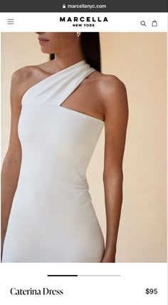 the back of a white dress with one shoulder cut out