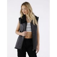 Step up your style game with No Boundaries Faux Shearling-Lined Vest! Designed for the trendsetter, it exudes fun, luxe flair. Embrace the cozy-chic vibes as you make a statement wherever you wear this elevated faux leather vest. Perfect for layering over your favorite outfits and adding a touch of street style edge, this faux shearling vest is the ultimate wardrobe for the fashion-forward. Only at Walmart. Size: S-M.  Color: Black.  Gender: female.  Age Group: adult. Faux Shearling Vest, Faux Leather Vest, Shearling Vest, Chic Vibes, Cozy Chic, Leather Vest, No Boundaries, Step Up, Trend Setter