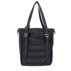 a black tote bag with two straps on the front and one strap hanging down