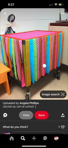 an image of a baby crib with colorful strips on the top and bottom side