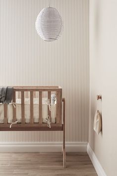 a baby crib in the corner of a room