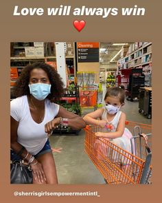 a woman and child wearing face masks while sitting in a shopping cart with the caption love will always win