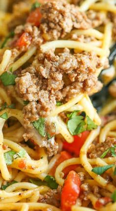 spaghetti with meat and vegetables on a plate