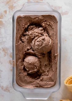 chocolate ice cream in a plastic container