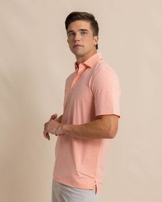 Classic stripes blend with modern coastal colors to craft a casual but considered polo. With striking color as far as the eye can see, the classic three-button placket, self-collar, and drop-tail hem construction keep it feeling sophisticated. Designed from quick-dry material with brrr° cooling technology, you'll feel ready for whatever the tide washes in. Style: 10621 Striped Collared Polo Shirt For Summer, Summer Striped Collared Polo Shirt, Summer Collared Polo Shirt With Horizontal Stripes, Classic Striped Polo Shirt With Collared Neckline, Classic Striped Collared Polo Shirt, Casual Summer Polo Shirt With Horizontal Stripes, Striped Relaxed Fit Polo Shirt For Summer, Summer Striped Relaxed Fit Polo Shirt, Casual Striped Polo Shirt For Golf