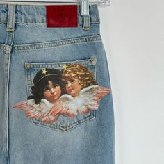 Fiorucci Angels Patch Tara Jeans Light Vintage Brand New Without Tags - No Faults Size: 25 Women’s Angels Patch Tara Jeans In A Light Vintage Wash, Featuring The Fiorucci Angels Patch On The Back Pocket. The Tara Jeans Are High-Waisted With A Tapered Leg, An Iconic 5-Pocket Design, Waistband With Belt Loop And A Button And Zip Fly. Hand-Crafted From Premium Denim Made Of Organic Cotton. Slim Fit Tapered Leg High Waist Belt Loops With Button And Zip Fly Closure 5-Pocket Style Originally $260 Fiorucci Jeans, Customized Jeans, Fiorucci Angels, 2000s Room, Angel Jeans, Danny Brown, Cool Jeans, Angels Jeans, Winter Fits