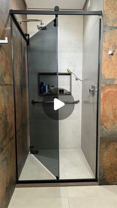 a walk in shower sitting inside of a bathroom