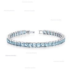 "princess cut swiss blue topaz tennis bracelet in sterling silver-blue topaz Bracelet-925 Sterling Silver Bracelet-For Gift Her Gemstone : Natural swiss blue topaz Stone Size :- 4 MM Stone Color : Best Stone Shape : Square Stone Polish : High Metal : 925 Sterling Silver Purity : 925 Parts Per 1000 Silver Polish : High PAYMENT OPTION** Etsy Keeps our payment secure that's why there is only platform..  PayPal Only WE ARE MANUFACTURERS '' (We Make Customized Jewelry On Bulk Order) We Make All Kind Style Theory, Topaz Bracelet, Blue Topaz Bracelet, Silver Polish, Square Stone, Blue Topaz Stone, Customized Jewelry, Wedding Jewelry Bracelets, Sky Blue Topaz