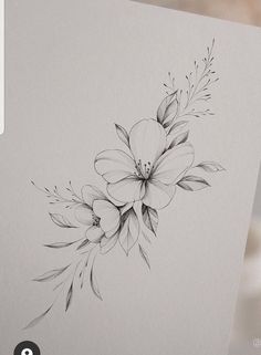 a pencil drawing of flowers and leaves on a piece of paper with the words,