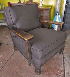 a chair that is sitting in the middle of a room