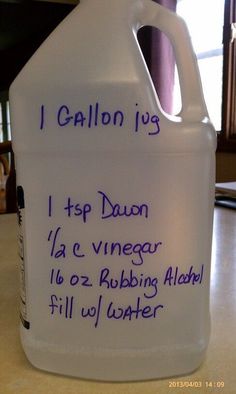 a gallon of liquid with writing on it