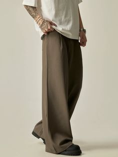 These Multi-Button High-Waisted Wide-Leg Trousers offer a sleek and stylish look with their high waist and wide-leg design. The multiple buttons add a unique touch while also providing a secure fit. Perfect for any occasion, these trousers are a must-have for your wardrobe. ■size(cm) Length Waist Hips S 100 66 94 M 102 70 98 L 104 74 102 XL 106 78 106 ■model 174cm 61kg L ■material polyester 80% viscose 20% Solid Baggy Wide Leg Pants, Casual Full-length Solid Color Dress Pants, Casual Full-length Solid Dress Pants, Casual Full Length Solid Color Dress Pants, Casual Full Length Solid Dress Pants, Trendy Solid Wide Leg Dress Pants, Trendy Solid Color Wide Leg Dress Pants, Casual Full Length Pants With Buttons, Casual Full Length Buttoned Pants