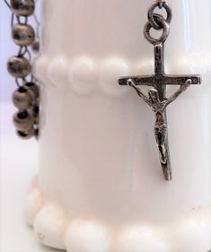 Unique rosary The cross is marked 925 The chain is the unique feature of this rosary It weighs 1.4oz If you have any questions please convo me before purchase I will be more than happy to help All sales are final. This shop does not offer refunds This shop ships only in USA please convo for exceptions Thanks for snooping in my attic :) Silver Cross Rosary, Vintage Silver Rosary Bracelet As Gift, Spiritual Silver Cross Rosary, Silver Cross Rosary Spiritual, Sterling Silver Spiritual Rosary With Crucifix, Silver Rosary With 8mm Beads And Crucifix, Spiritual Sterling Silver Crucifix Rosary, Elegant Silver Crucifix Rosary, Silver Rosary With Faceted Beads