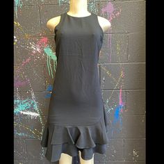 A Tiered Ruffle Hem Adds Just The Right Flounce And Frill To This Flattering, Figure Hugging Black Sleeveless Dress! Fully Lined! Exposed Gold Back Zipper Closure! Perfect For A Wedding Or Work Or Any Special Occasion! Brand New With Tags & Zero Flaws. Size 2! Tiered Ruffle Dress, Black Sleeveless Dress, Black Sleeveless, Ruffle Dress, Ruffle Hem, No Frills, A Wedding, Sleeveless Dress, Colorful Dresses