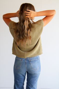 Stay cozy in this best-selling Prague Mock Neck Top! Crafted with organic cotton, it features a slouchy fit with a pocket. Its olive hue will be a stylish addition to your wardrobe. Experience this highly awaited restock—get yours now! How to style: Pair with your favorite pair of jeans for a relaxed yet cool girl vibe. About the product Olive in color Slouchy fit Pocket Mock Neck Knitted material 100% cotton Green Soft Knit Top With Relaxed Fit, Green Relaxed Fit Soft Knit Top, Casual Khaki Sweater With Relaxed Fit, Casual Green Everyday Sweater, Casual Everyday Green Sweater, Green Everyday Tops For Fall, Everyday Green Tops For Fall, Cozy Green Top For Everyday, Green Relaxed Fit Sweater With Pockets