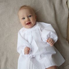 Christening White Gown made from pure cotton, decorated with lace.  An excellent choice for a christening day or birthday occasion.  - Cotton - Satin - Color White - For birthday celebration - For the baptism - Set of dress, hat, and booties are optional upon request - Wash Machine and hand washing delicate 104 F / 40 C, delicate steaming Size Chart for child's height: Dress Preemie           50 - 56 cm    19.68 - 22.04 inches  Newborn          56 - 62 cm     22.04 - 24.40 inches 0-3 months      62 - 68 cm     24.40 - 26.77 inches 3-6 months      68 - 74 cm     26.77 - 29.13 inches 6-9 months      74 - 80 cm     29.13 - 31.49 inches 9-12 months     80 - 86 cm     31.49 - 33.85 inches 12-18 months   86 - 92 cm     33.85 - 36.22 inches 18-24 months   92 - 98 cm     36.22 - 38.58 inches bigge Elegant Cotton Baptism Dress, Fitted Baptism Dress With Bow, Cotton Baptism Dress, Classic First Communion Dress With Lace Trim For Baptism, Cotton Dress With Lace Collar For Baptism, Elegant Cotton Baptism Dress With Broderie Anglaise, White Long Sleeve Baptism Dress With Lace Trim, Lace Baptism Dress With Lace Collar, Fitted Broderie Anglaise Baptism Dress