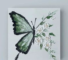 a painting of a green butterfly with white flowers