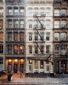 an image of a building in the snow with fire escapes on it's side