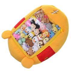 a bunch of small stuffed animals in a yellow case