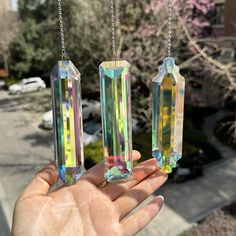 PRICES MAY VARY. This crystal pendants are made by hand,Length 4.7 inches.Hanging them in a sunny room and watch your personal rainbow appear and enjoy it. We have provided you with metal hooks cord for easy hanging to wherever you like such as garden, backyard,window,porch,balcony,tree,plants,car rear view mirror. As a gift on Valentine's Day,Mother's Day,Wedding,Birthday,Thanksgiving,Christmas, these great rectangle crystal suncatcher decor are good choice. The crystal balls prisms combined with chains are colorful shining. Each hanging crystal sun catcher presents a beautiful and unique color. These charming shiny ornaments will brighten up your place and create pretty rainbows under the natural light. The set includes 3 pieces of colorful crystal suncatcher chain, Each one can meet you Crystal Prisms Sun Catcher, Agate Suncatcher, Suncatcher Decor, Hanging Suncatchers, Window Porch, Crystal Room Decor, Sunny Room, Prism Rainbow, Glass Prism