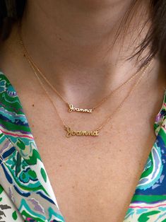 Customize your own necklace with various initials or a word. Please specify the word desired in the comment box upon checkout. Customization requires 6-8 weeks for delivery Biggest letter measures 9.5mm The rest of the letters are 3.5mm Chain measures 16" with an extension at 15" & 14" 14k yellow gold Cursive Words, Big Letters, Nameplate Necklace, Plate Necklace, A Word, Solid Metal, 8 Weeks, Name Plate, Name Necklace