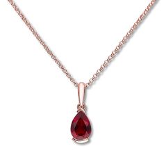 This lovely necklace for her features a pear-shaped lab-created ruby half bezel-set in 10K rose gold. The pendant suspends from an 18-inch cable chain that secures with a lobster clasp. Ruby Necklace Simple, Ruby Heart Pendant, Aesthetic Rings, Half Bezel, Ruby Heart, Diamond Pendant Sets, Stone Jewellery, Jared The Galleria Of Jewelry, Necklace For Her