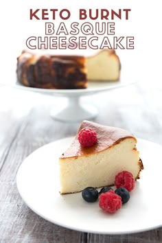 a piece of cheesecake on a plate with raspberries