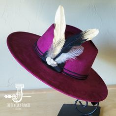 If you’re looking for the perfect accessory to complement your favorite boho style, look no further. This Boho-Style Western Felt Hat w/ Natural Feather & Turquoise Hat Accent by The Jewelry Junkie is absolutely everything that you need. Not only is it easy to incorporate into any and all outfits, but the genuine leather and natural feathers of the band immediately elevate whatever it is you’re wearing. One Size Hat with adjustable inner hat liner (see last photos) The same primary feathers will Bohemian Fedora For Kentucky Derby, Bohemian Felt Hat With Flat Brim For Kentucky Derby, Bohemian Brimmed Fedora For Kentucky Derby, Bohemian Hat Bands With Flat Brim, Bohemian Flat Brim Fitted Hat Bands, Bohemian Hats With Feathers And Curved Brim, Bohemian Fitted Hat Band For Kentucky Derby, Bohemian Felt Hat For Festival, Fitted Bohemian Felt Hat For Festival