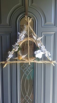 a wreath is hanging on the front door