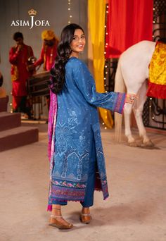 By Pcs: 3 PcsShirt: LawnTrouser: CambricDupatta: LawnColor: Blue This blue ensemble invites you to wander through a timeless paradise. The shirt boasts a mesmerizing design, reminiscent of a meticulously planned ancient garden, where floral patterns intertwine with traditional motifs. The contrasting dupatta, adorned with a vibrant floral print, echoes the spirit of the outfit, leaving a lasting impression. DESIGN DETAILS: 1.7 meter wider width digital lawn shirt 2.5 meter digital lawn dupatta 2 Ancient Garden, Asim Jofa, Traditional Motifs, Lawn Shirts, Floral Patterns, Design Details, Lawn, Floral Pattern, Paradise