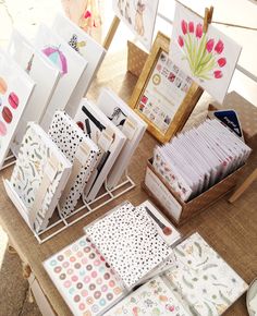 various cards and envelopes on a table