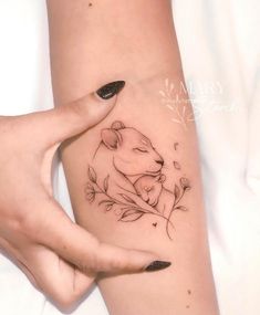 "The Ultimate 3D Tattoo Inspiration: 40+ Awesome Designs" Mutterschaft Tattoos, Tattoo Main, Tato 3d, Motherhood Tattoos, Mom Tattoo Designs, Mommy Tattoos, Mother Tattoos, Tattoo For Son, Tatuaje A Color