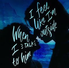 the silhouette of two people kissing in front of a blue background with words written on it