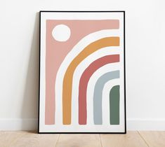 a framed art print with an abstract design in pastel colors on a white wall