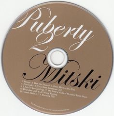 a cd disc with the word'liberty'written in cursive writing