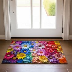 a door mat with colorful flowers on it