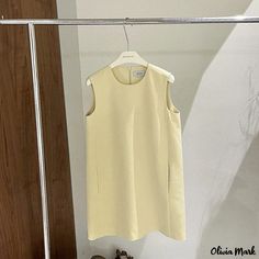 Olivia Mark - Sleeveless Casual Midi Dress with Minimalist Design Sleeveless Mini Dress For Summer Workwear, Minimalist Sleeveless Dresses For Workwear, Minimalist Sleeveless Dress For Work, Solid Sheath Sleeveless Dress For Summer, Solid Color Spring Sleeveless Dress, Casual Sleeveless Dress For Work, Sleeveless Mini Dress For Work In Spring, Lemon Color, Casual Midi Dress