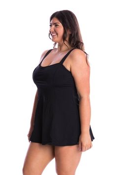 Black Plus Size Chlorine Resistant Swim Dress without Pant Your favourite swim dress style is now available in a new design. The new wide strap swim dress features the same dress design and shelf bra support, but without the built in pant. Enjoy the coverage and support of the original swim dress with the convenience of a two piece. Similar to a long line tankini, you can choose to wear your swim dress with your preferred chlorine resistant swim pant. Shelf-bra Moulded Cups Mastectomy Pouch Adjustable straps Fabric : 100% Polyester UPF 50+ Location model wears size 14 Studio model wears size 16 Poolside Tankini With Built-in Bra, Fitted Sleeveless Swimwear With Built-in Liner, Sleeveless Tankini With Built-in Bra For Poolside, Fitted Swim Dress With Built-in Bra, Solid Sleeveless Swim Dress With Built-in Bra, Fitted Sleeveless Swim Dress With Built-in Liner, Solid Swim Skirt With Built-in Bra For Pool, Spaghetti Strap Tankini With Built-in Bra For Swimming, Stretch Camisole Tankini With Built-in Bra