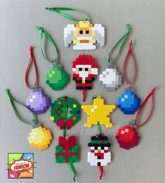 christmas ornaments made out of legos on a table