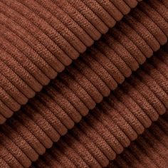 close up image of brown fabric textured with wavy lines on the top and bottom