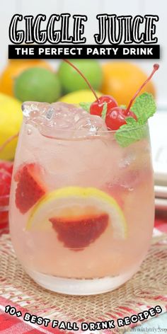 a pink drink with lemons and cherries in it