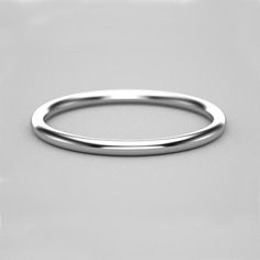 a plain wedding ring is shown on a white background with space for the wording