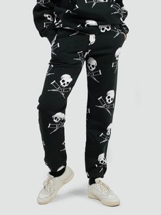 Skull Print Cotton Bottoms For Streetwear, Cotton Pants For Halloween Streetwear, Casual Black Skull Print Bottoms, Casual Black Bottoms With Skull Print, Winter Cotton Sweatpants With Graphic Print, Casual Black Pants With Skull Print, Casual Cotton Pants For Halloween, Casual Streetwear Bottoms With All Over Print, Casual Bottoms With All Over Print For Streetwear